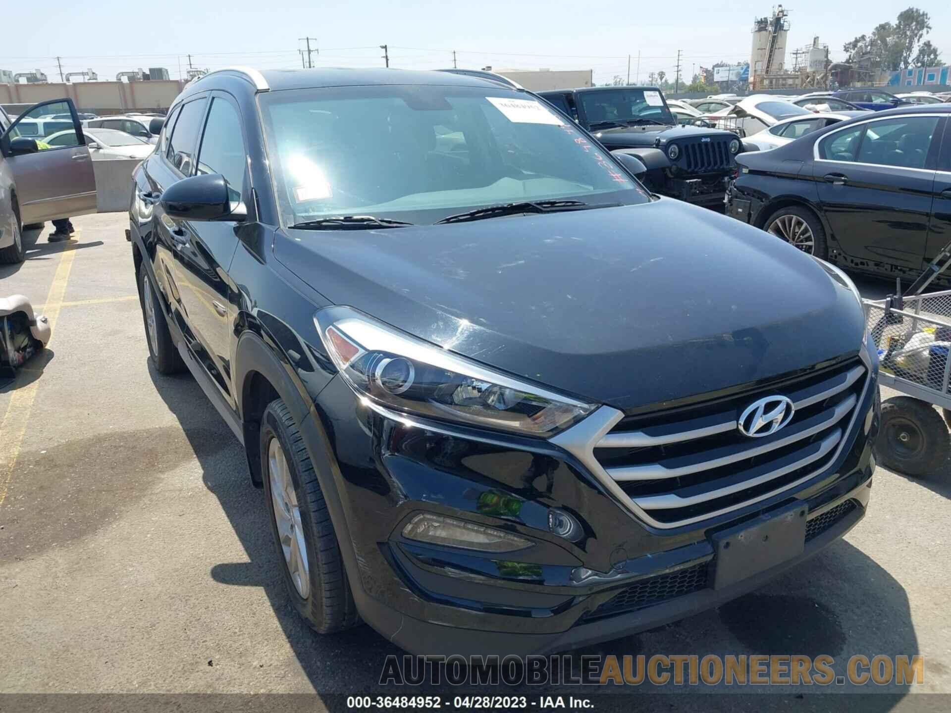 KM8J3CA48JU779698 HYUNDAI TUCSON 2018