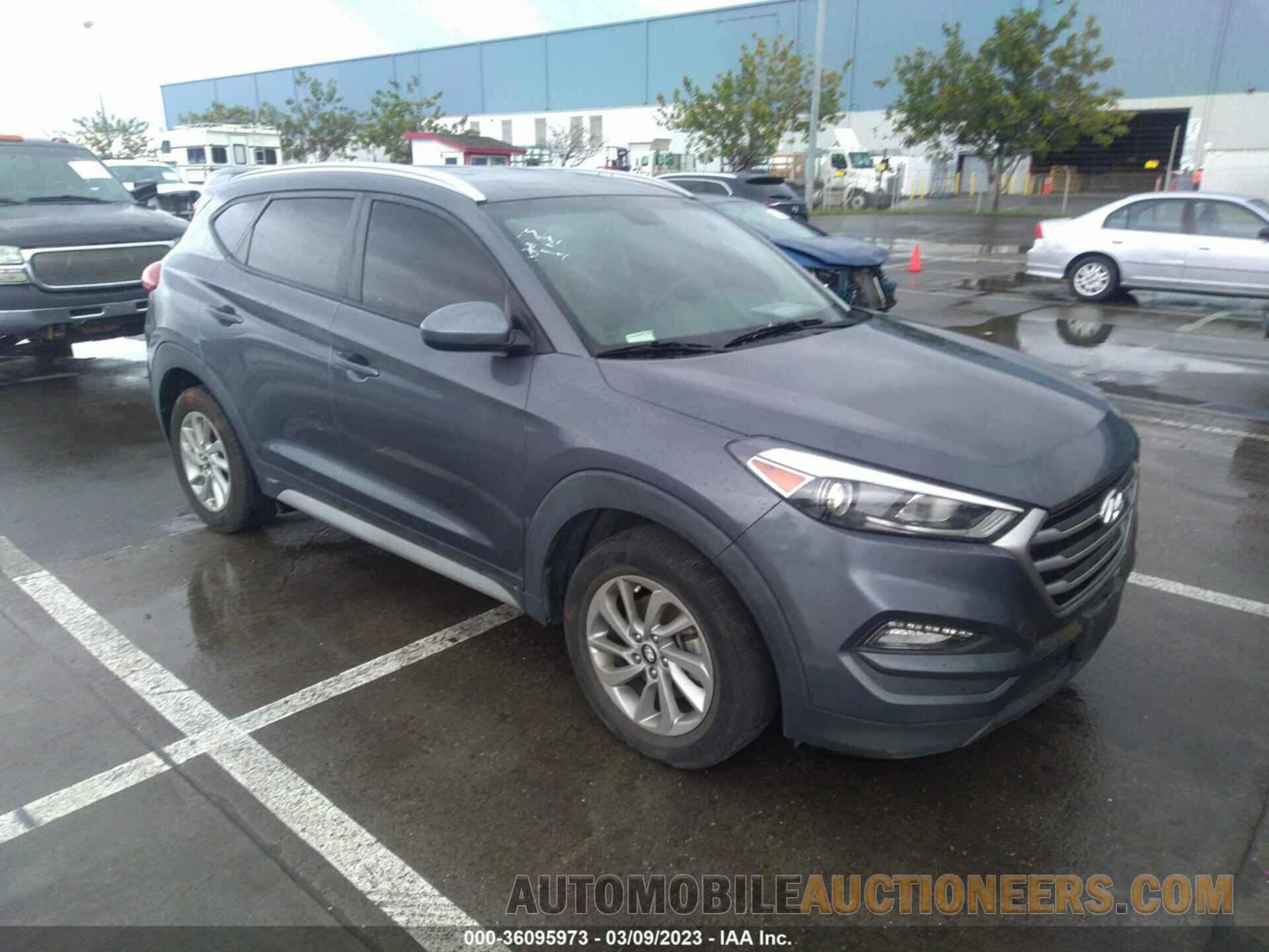 KM8J3CA49JU597119 HYUNDAI TUCSON 2018