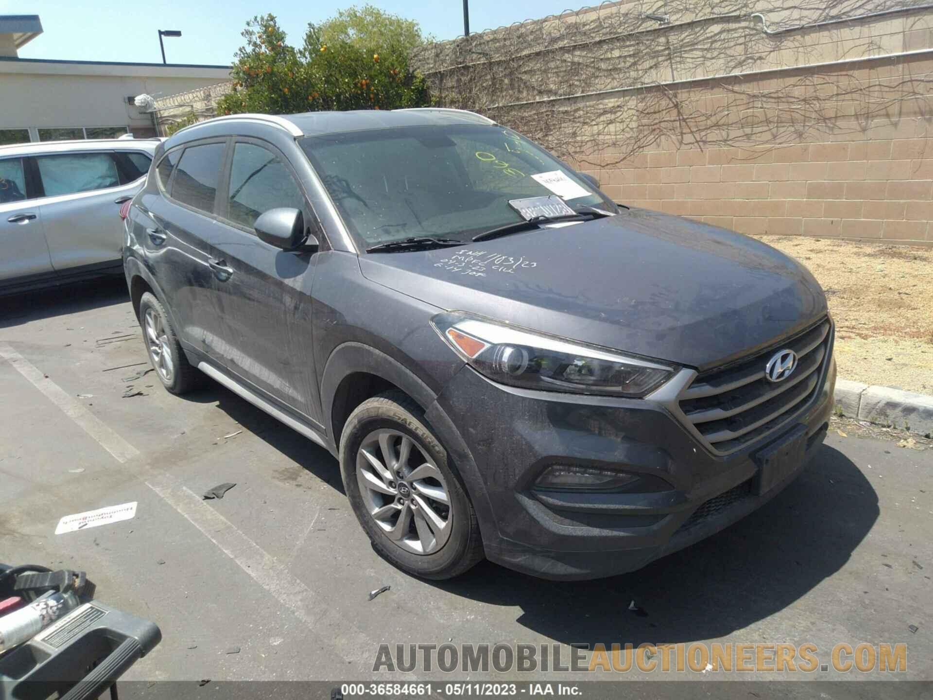 KM8J3CA49JU606353 HYUNDAI TUCSON 2018