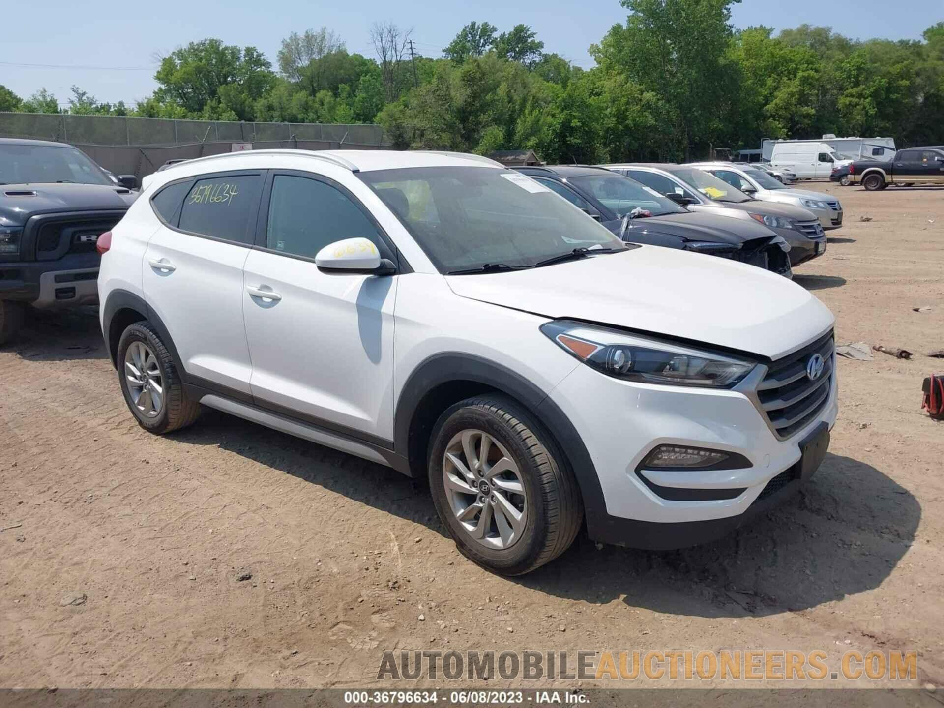 KM8J3CA49JU609592 HYUNDAI TUCSON 2018