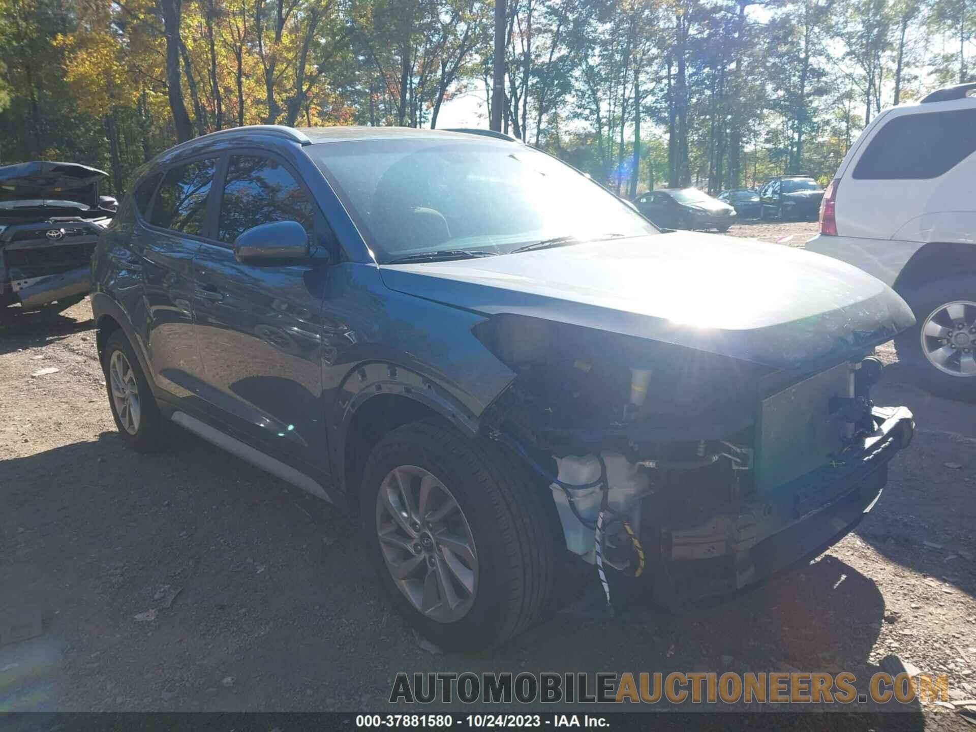 KM8J3CA49JU642785 HYUNDAI TUCSON 2018