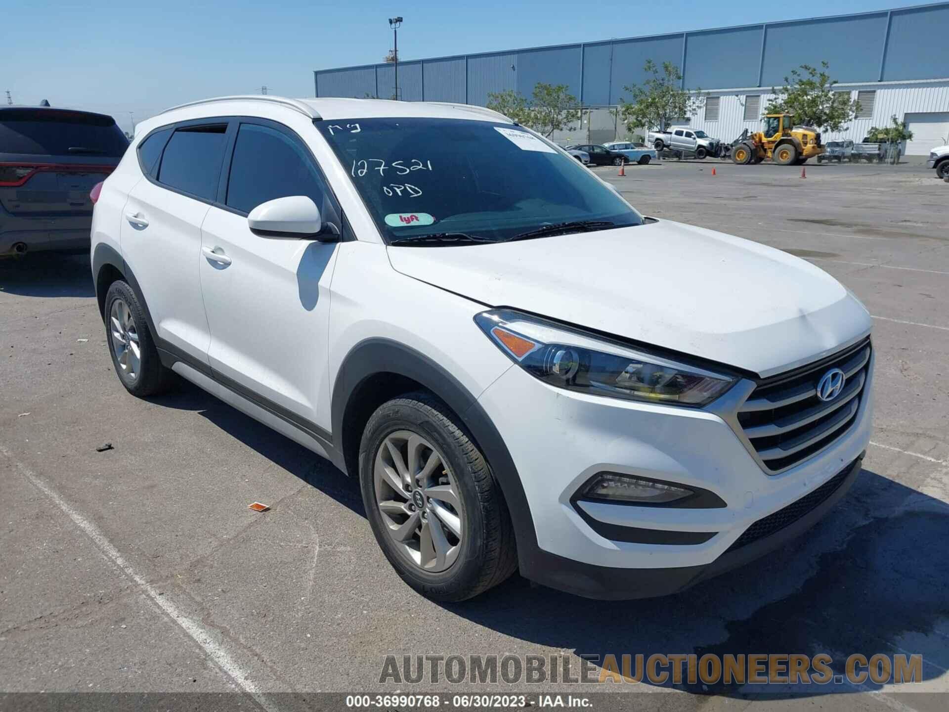 KM8J3CA49JU764952 HYUNDAI TUCSON 2018