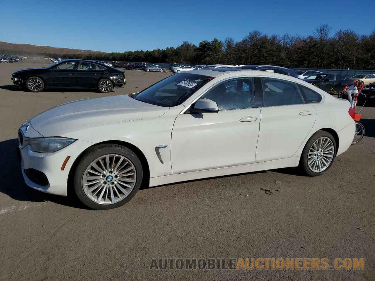 WBA4C9C53FD331299 BMW 4 SERIES 2015